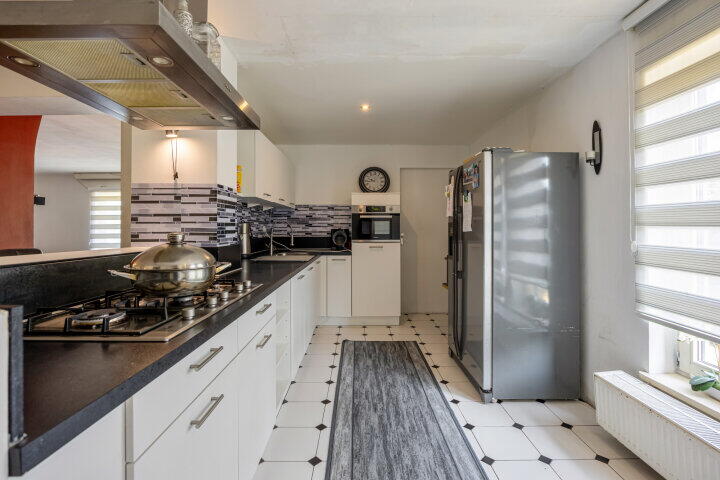 Foto 10 - Schoolstraat 14, Opgrimbie